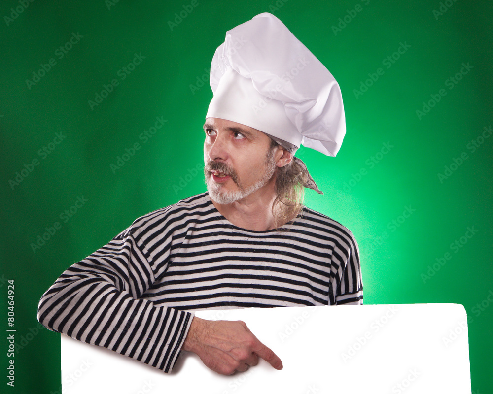 The man with gray beard in a hat chef with billboard The man with gray beard in a hat chef with billboard
