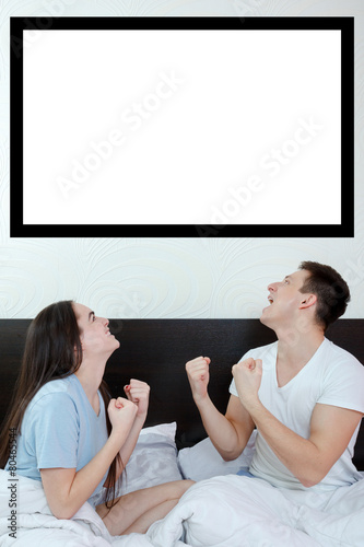 happy couple looking up at empty copyspace place