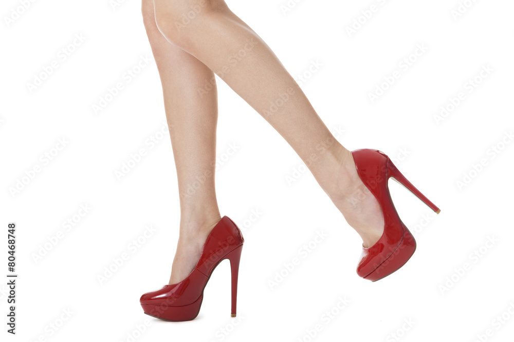 Flawless Woman Legs in Elegant Red High Heel Shoes Flawless Woman Legs in Elegant Red High Heel Shoes