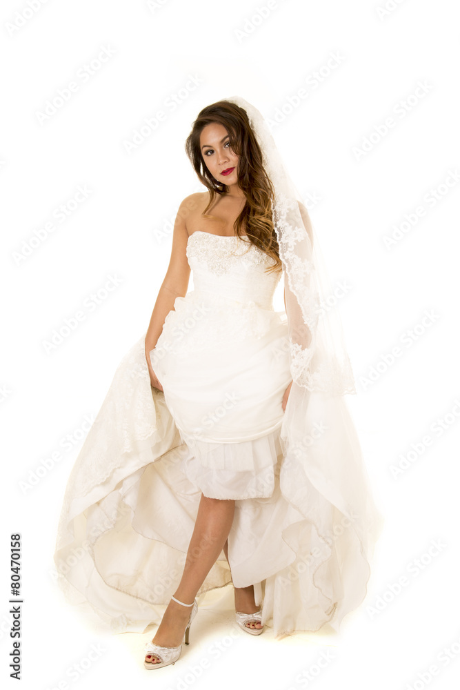 woman in a wedding dress showing her legs