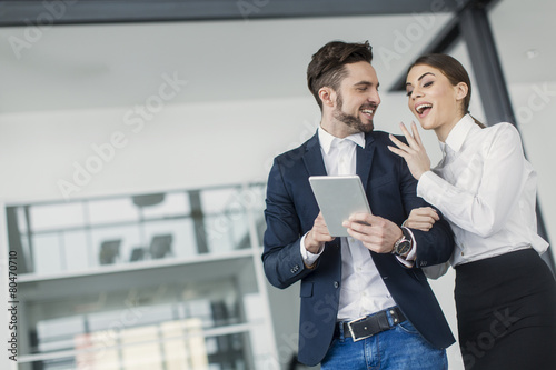 Young people with tablet in...