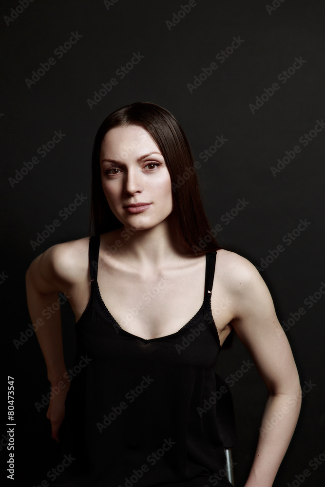 woman portrait black background in studio woman portrait black background in studio