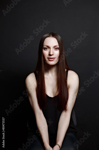 woman portrait black background in studio
