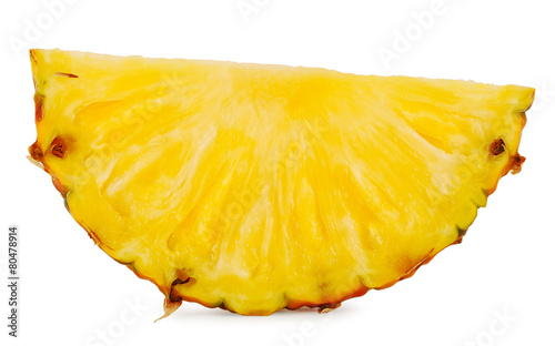 Slice of bright yellow ripe pineapple