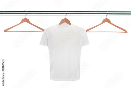 white t-shirts on hangers isolated on white