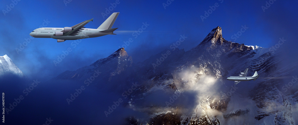 Fototapeta premium large aircraft and small plane on a background of high mountains