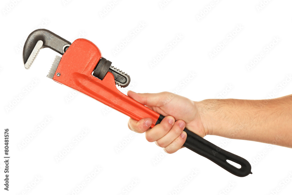 Plumbing wrench in male hand isolated on white Plumbing wrench in male hand isolated on white