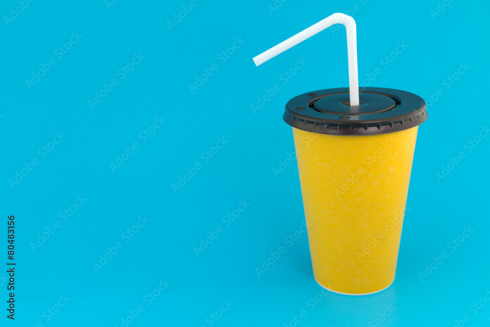 Yellow paper cup with straw Yellow paper cup with straw
