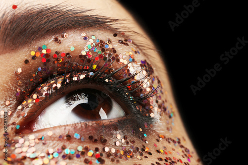 Female eye with fancy glitt...