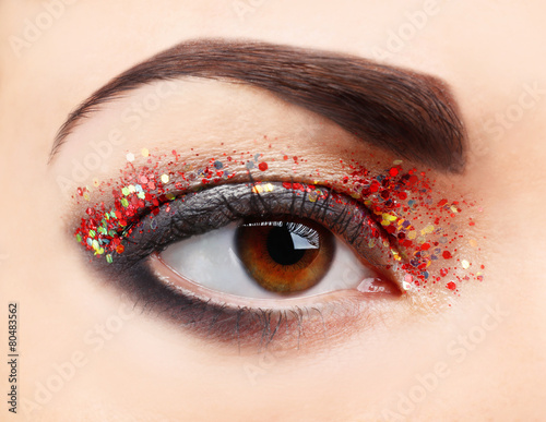 Female eye with fancy glitt...