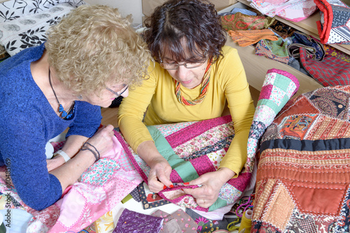 two women working on their quilting