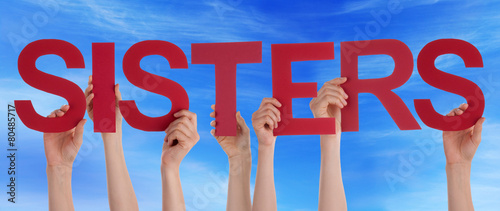 Many People Hands Holding Red Straight Word Sisters Blue Sky photo