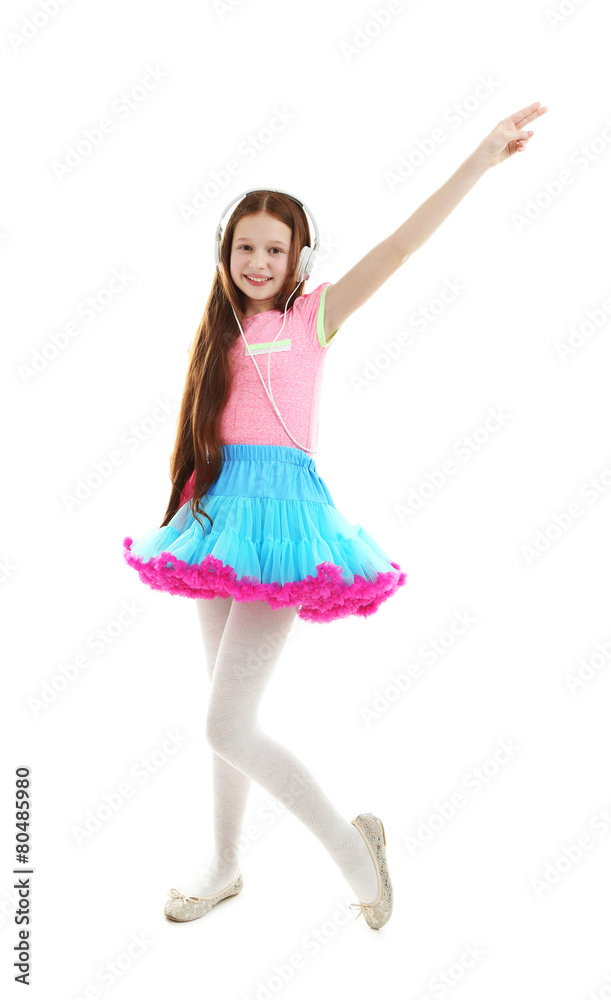 Fototapeta premium Beautiful little girl with headphones, isolated on white