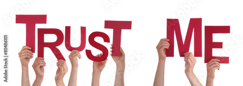 Foto People Hands Holding Red Word Trust Me