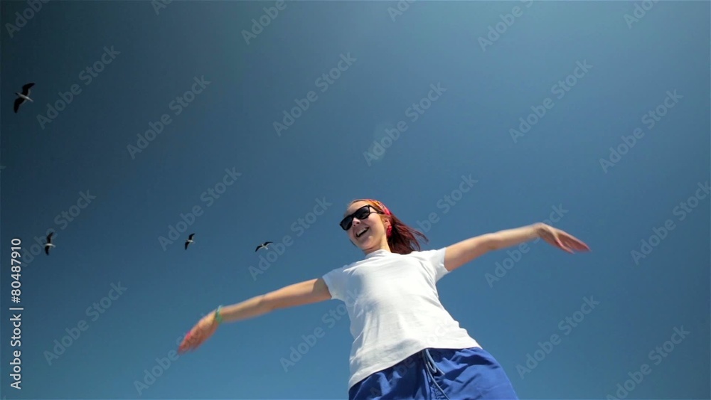 Young, beautiful, happy girl woman relaxing under the sky with Young, beautiful, happy girl woman relaxing under the sky with