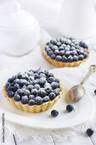 Vászonkép tart with fresh bluebeeries and icing sugar
