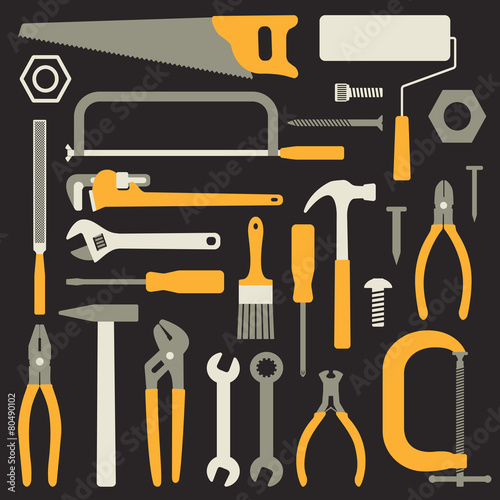 Various hand tools vector silhouette icons on black background