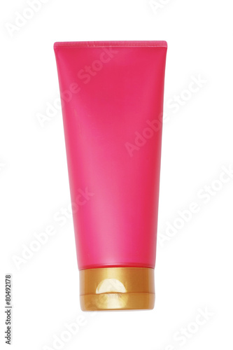 pink plastic tube with closed yellow  flip top lid