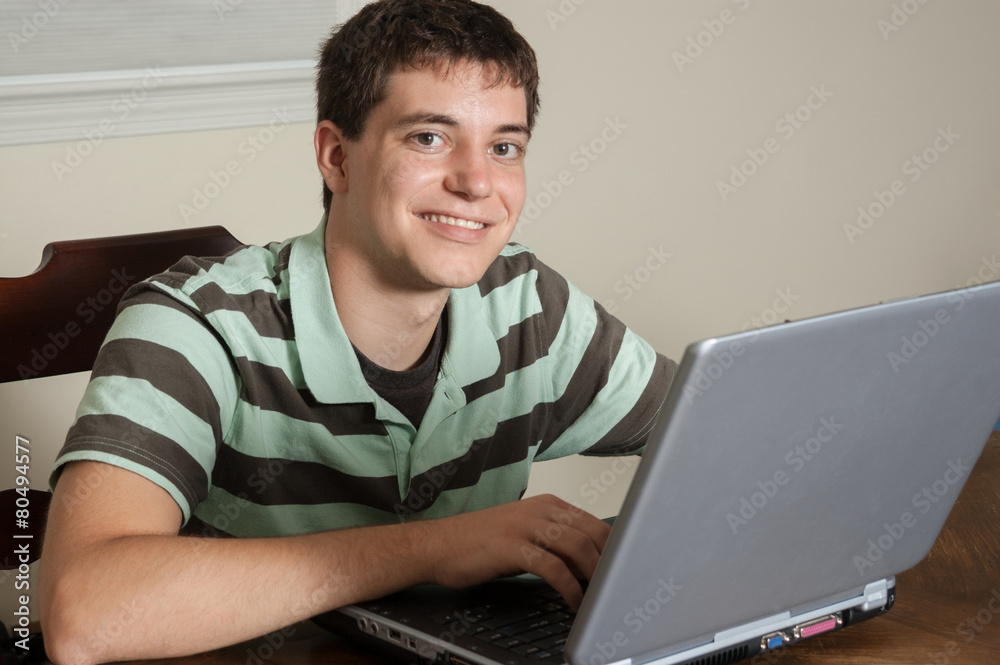 Teen boy on laptop Teen boy on laptop