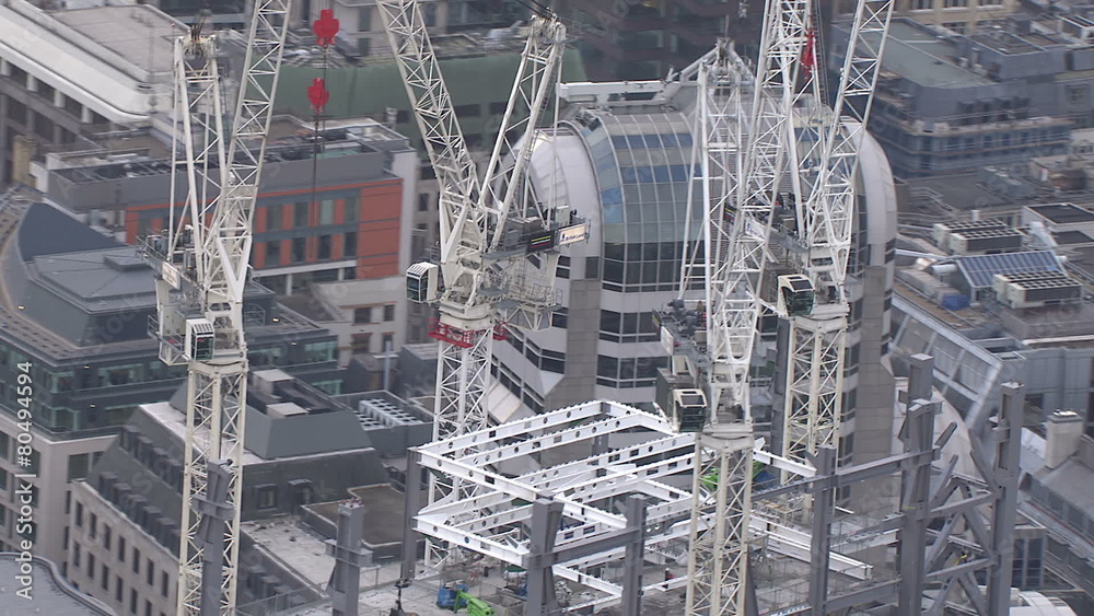 Aerial view of construction cranes in the city of London