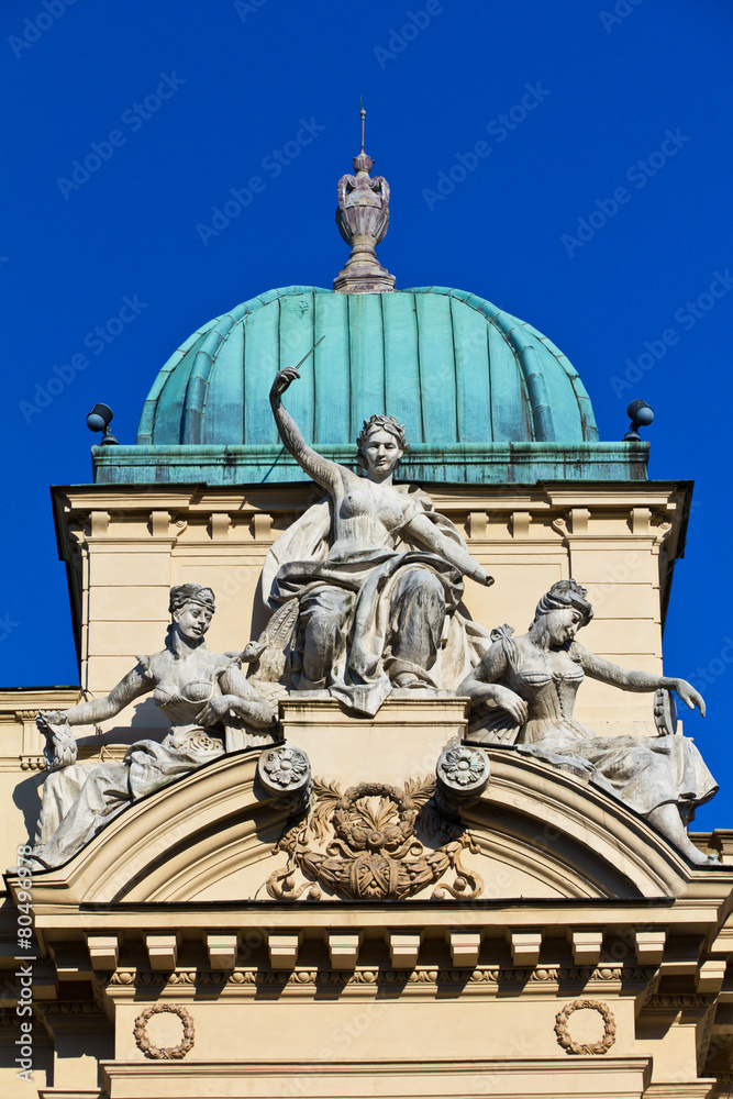 sculpture of three women oni theater in cracow in poland