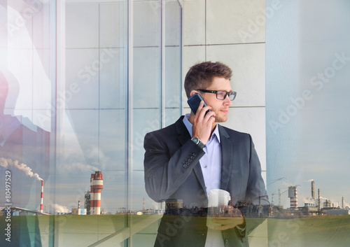 double exposure of urban attractive businessman with phone devic photo