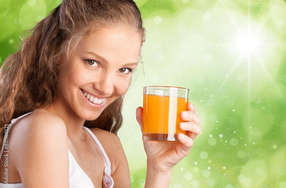 Juice. Young attractive happy woman with glass of juice Juice. Young attractive happy woman with glass of juice