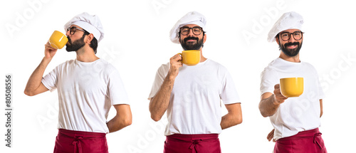 Chef holding a cup of coffee