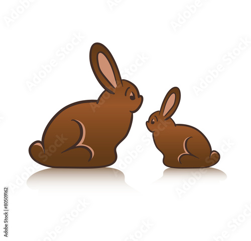 Chocolate rabbits on white background