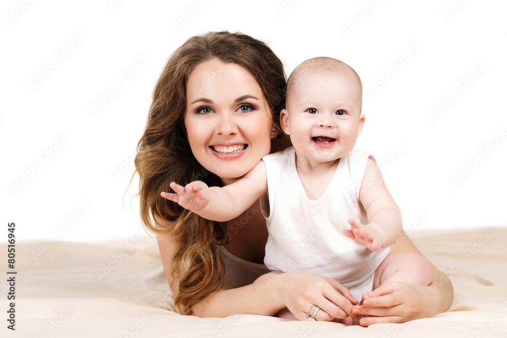 Portrait of happy mother with baby on a white background.