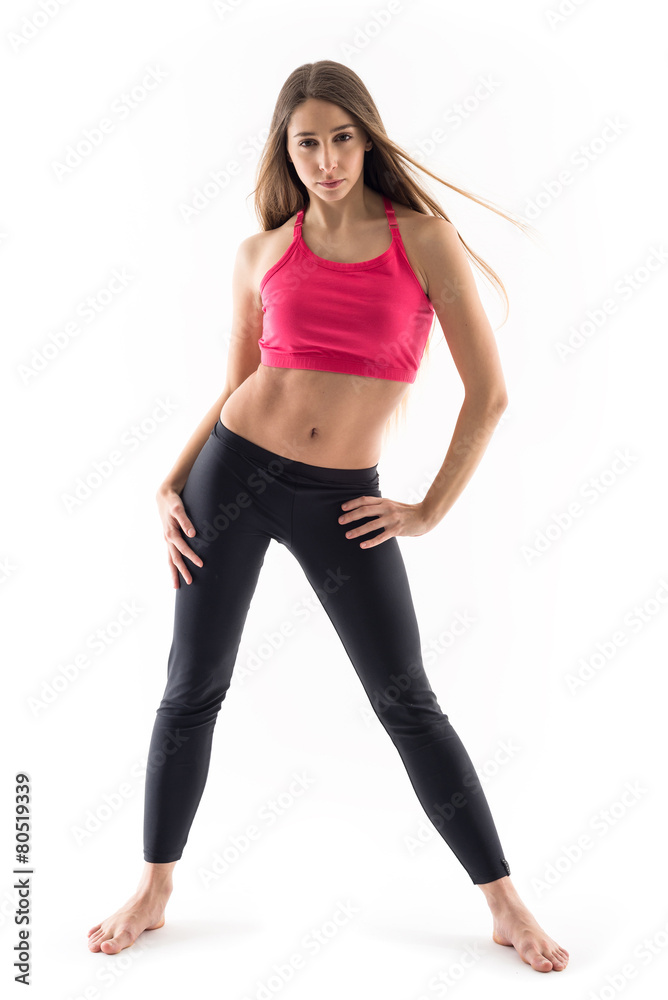 Sporty young woman isolated against white background. Full body Sporty young woman isolated against white background. Full body