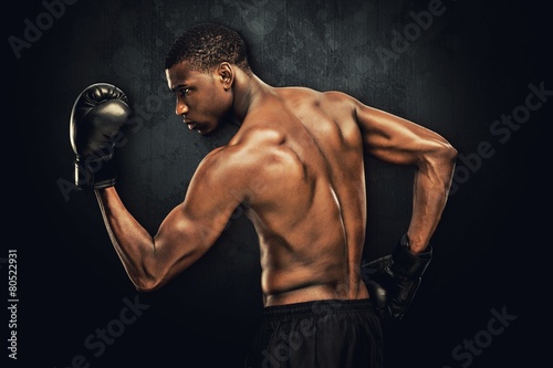 Composite image of muscular boxer © WavebreakMediaMicro