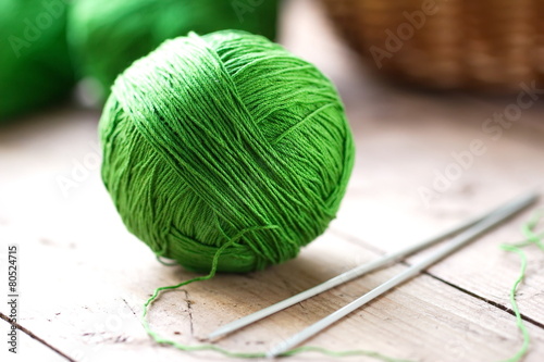 Clew of yarn with needles