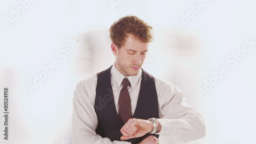 Time lapse of businessman frozen in time as the rest of the world rushes by