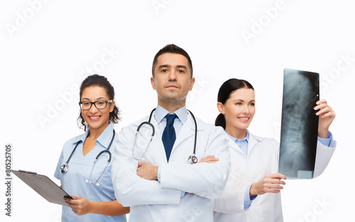 group of medics with x-ray photo