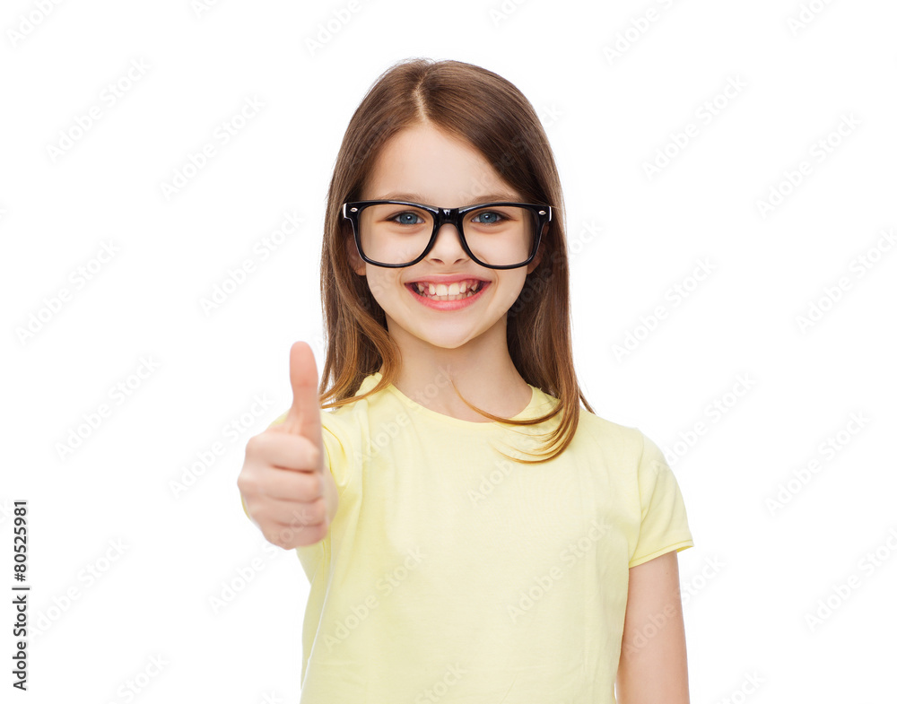 smiling cute little girl in black eyeglasses smiling cute little girl in black eyeglasses