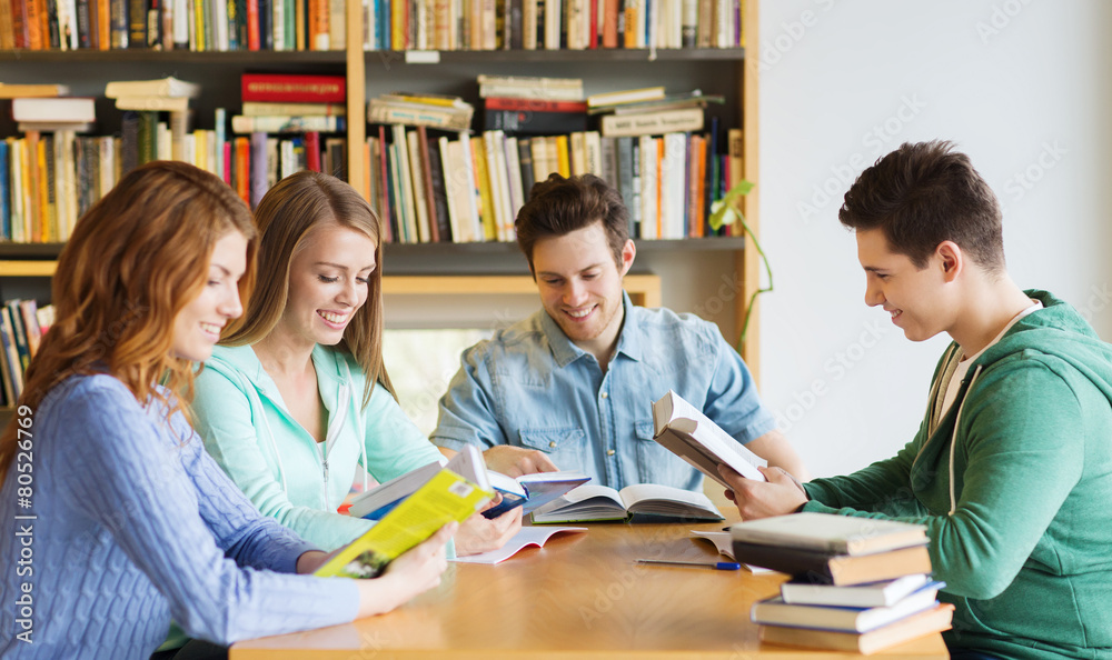 students with books preparing to exam in library students with books preparing to exam in library