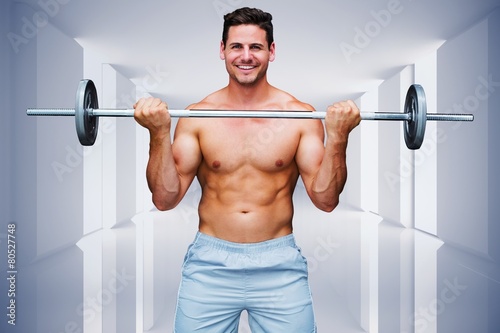 Composite image of handsome bodybuilder