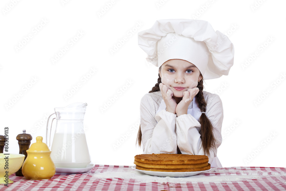 Cooking and people concept - smiling little girl in cook hat Cooking and people concept - smiling little girl in cook hat
