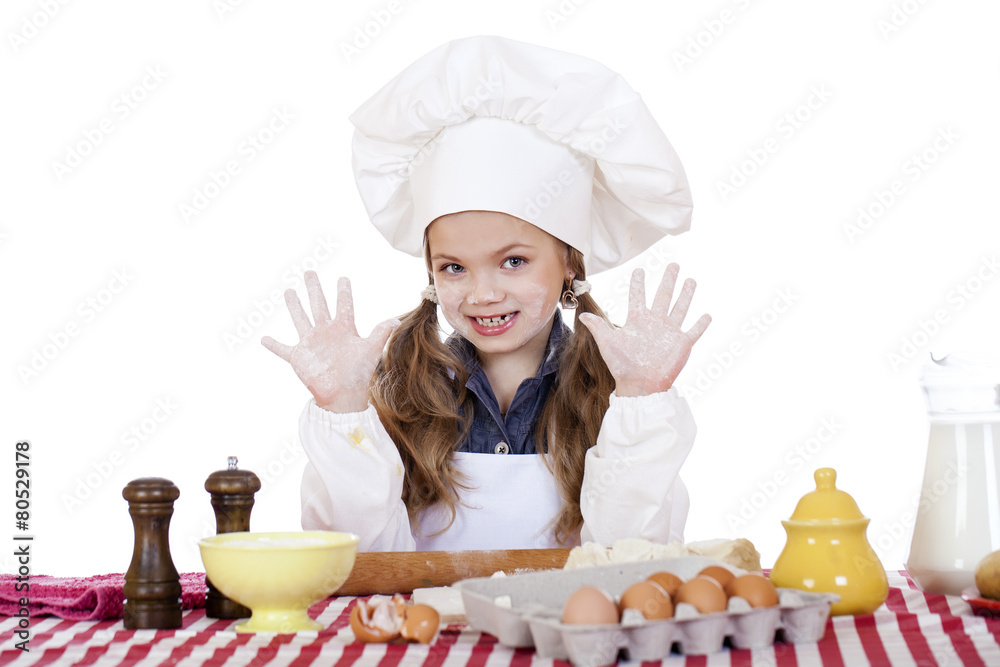 cute little girl baking on kitchen and shows hands cute little girl baking on kitchen and shows hands