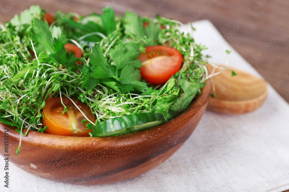 Cress salad with sliced cucumber, cherry tomatoes and parsley Cress salad with sliced cucumber, cherry tomatoes and parsley