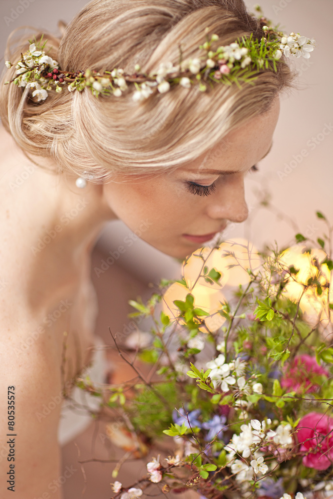 Tender beauty portrait of bride with flowers wreath in hair