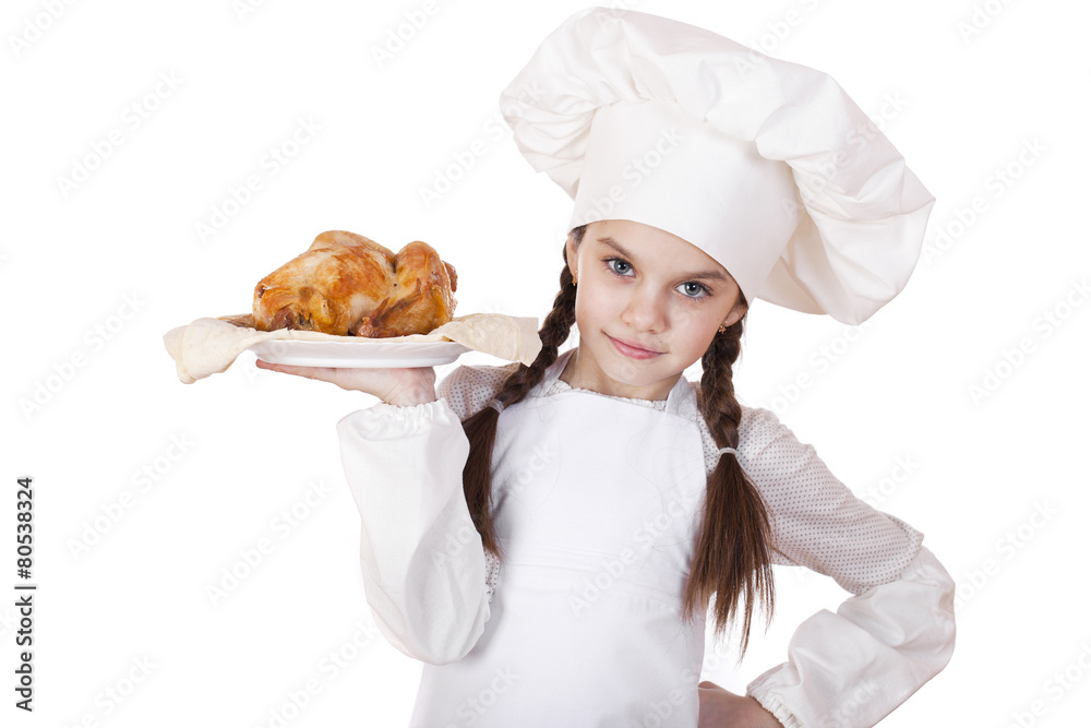 Cooking and people concept - smiling little girl in cook hat Cooking and people concept - smiling little girl in cook hat