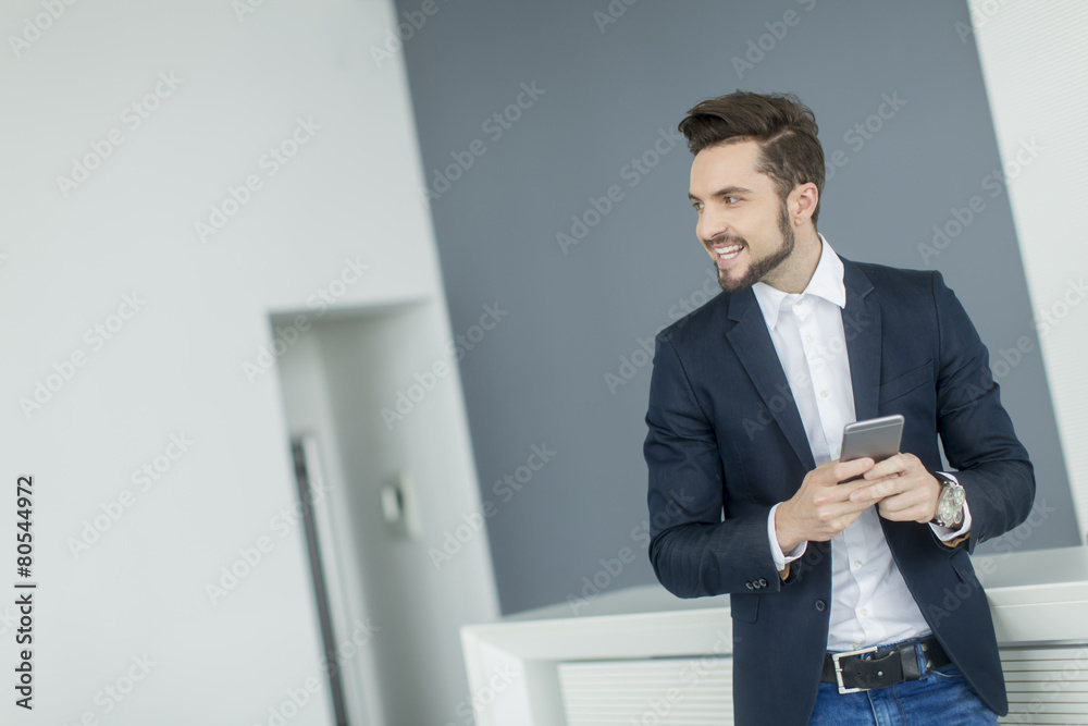 Young man with mobile phone Young man with mobile phone