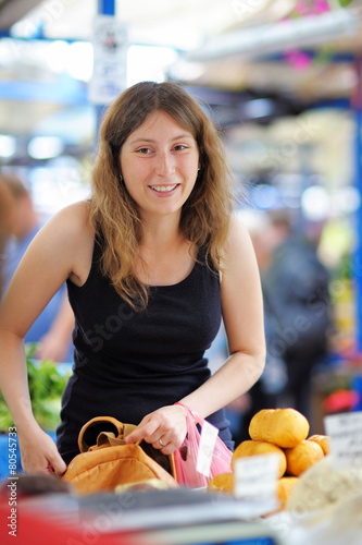 Young woman at the farmer market