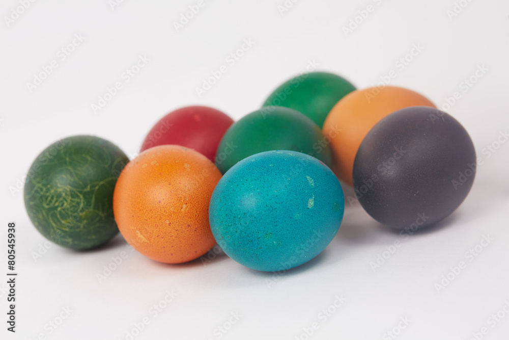 colorful painted Easter eggs on a white background colorful painted Easter eggs on a white background