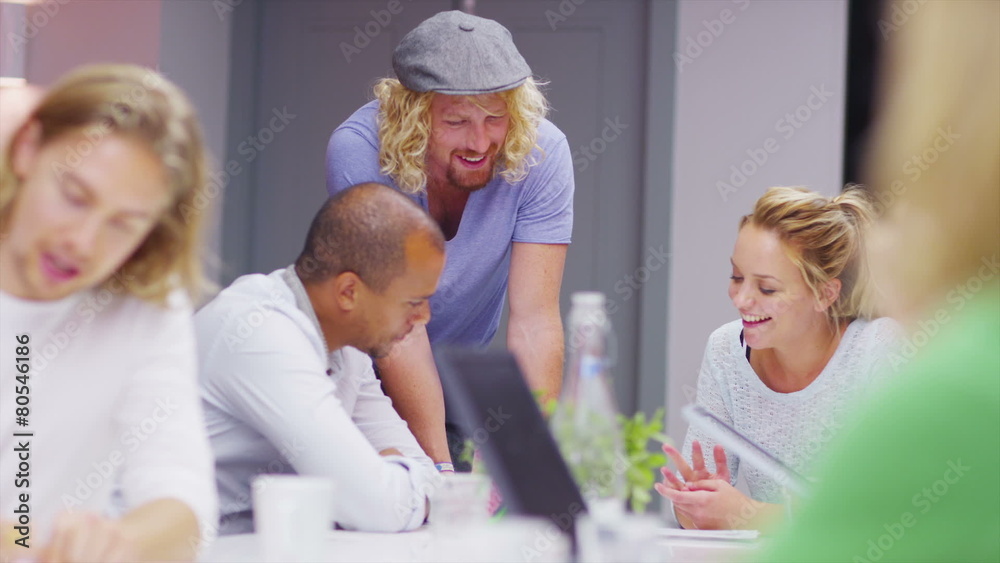 Casual creative business team brainstorming for ideas in a meeting Casual creative business team brainstorming for ideas in a meeting
