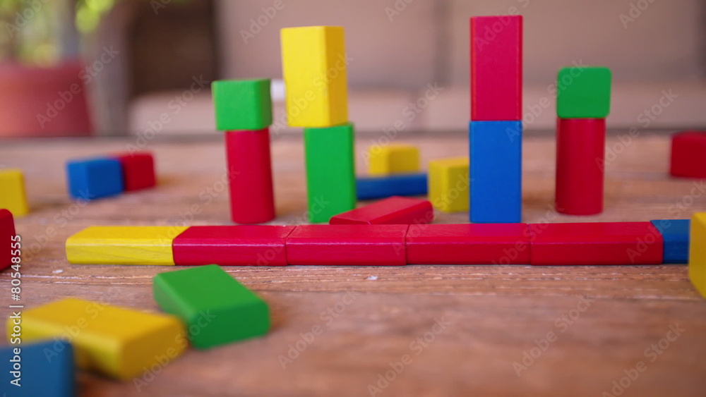 Panning over colorful building blocks on table