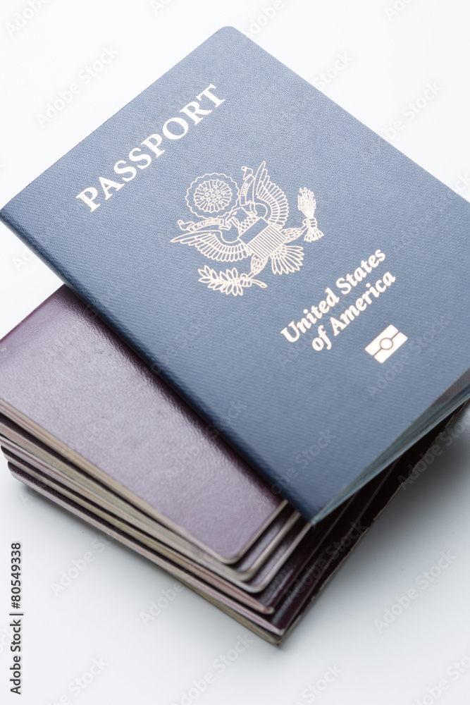 American Passport on Top of Other Passports American Passport on Top of Other Passports