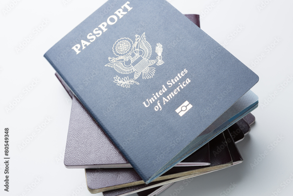American Passport on Top of Other Passports American Passport on Top of Other Passports